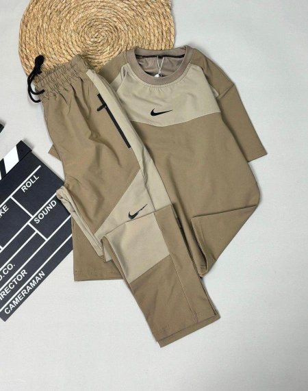 ترينج ولادي :nike"10-18